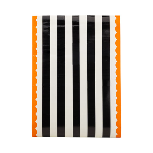 Camino de Mesa en papel con rayas naranjas y negras